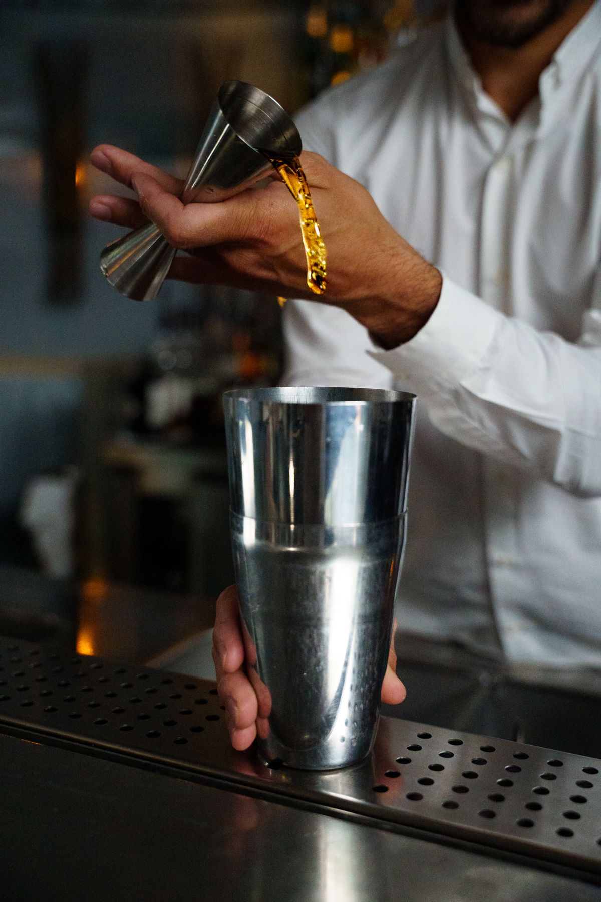 Close-up of cocktail preparation